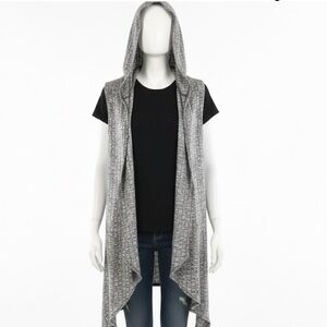 FREE KISSES HOODIE LONG VEST COVER UP. SIZE LARGE. GENTLY USED.